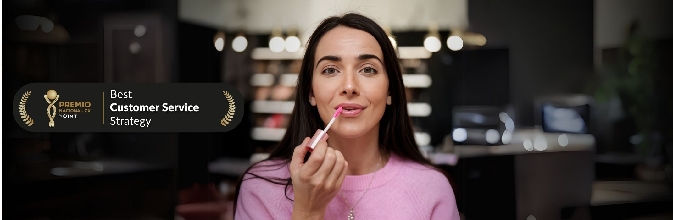 woman applying lip gloss